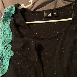 Cold shoulder long sleeve shirt.